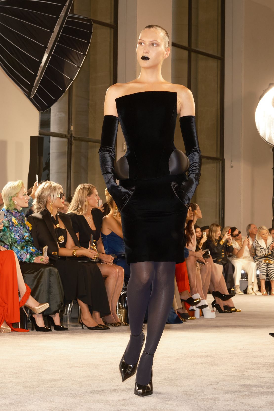 Schiaparelli's ethereal approach also extended to the makeup, as models wore black lipstick.