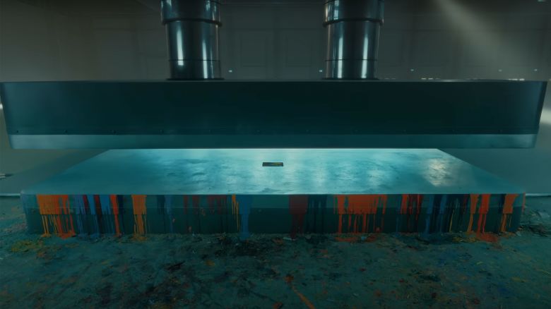 In this still from Apple's new iPad Pro ad, the iPad is revealed after the hydraulic press opens.