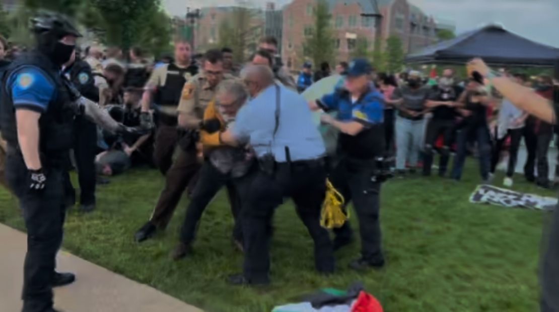 Steve Tamari is seen being taken into custody during a demonstration at Washington University in St. Louis.