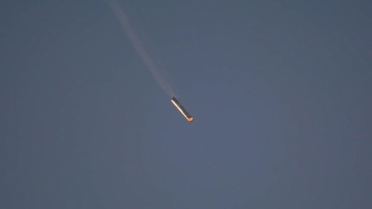 The SpaceX Super Heavy rocket booster returns to the launch pad near Boca Chica, Texas, on October 13.