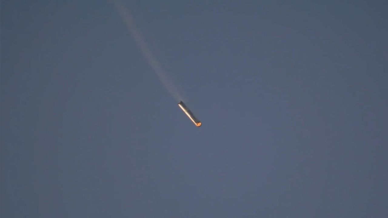 The SpaceX Super Heavy rocket booster returns to the launch pad near Boca Chica, Texas, on October 13.