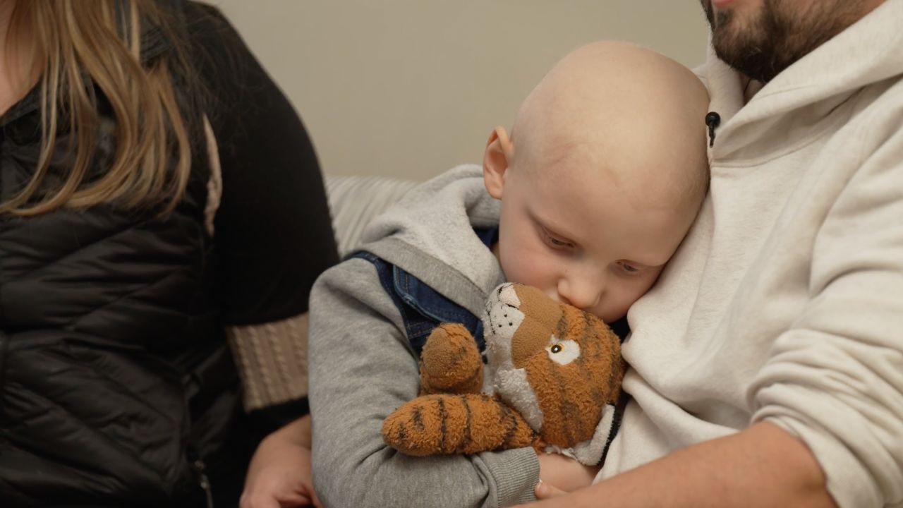 A kindergartner, Cailen Vela, hopes for beating cancer are tied to federal grants now on the chopping block