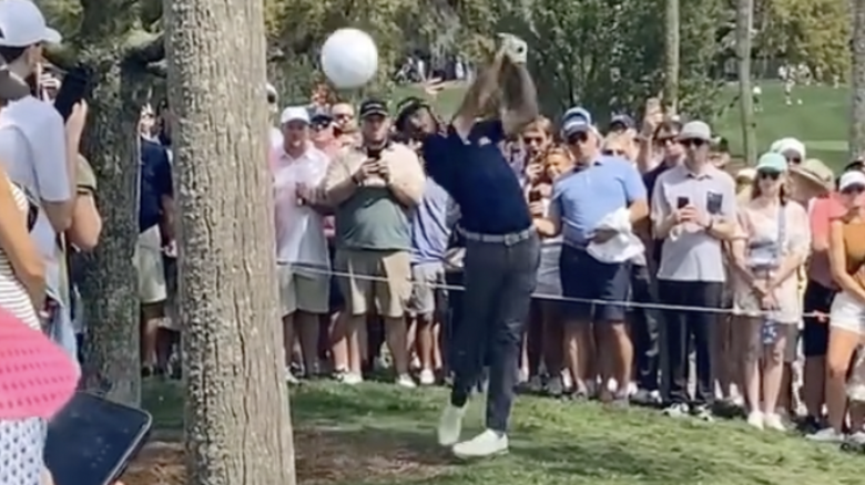 A screengrab taken from a video posted to TikTok showing a ball played by Max Homa sailing towards a crowd of fans who had gathered too closely to watch the American golfer take a shot during the The Players Championship.