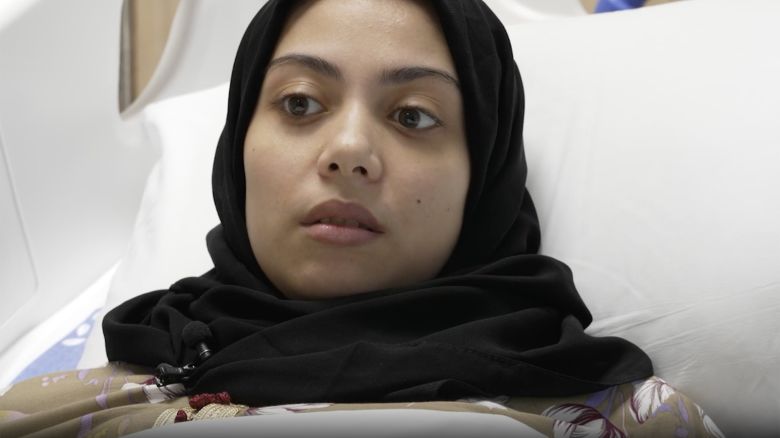 Raneem Hijazi recounts the night of the Israeli airstrike that killed one-year-old son Azouz, from a hospital bed in Doha, Qatar, where she's receiving treatment after left arm was amputated, and both legs sustained extensive damage, requiring bone grafts to repair them.