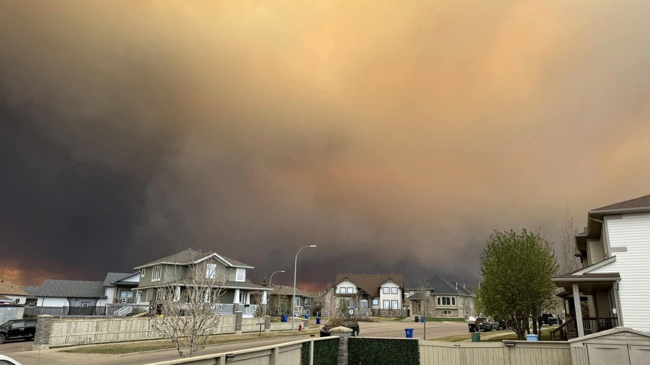 Flames and smoke fill the air as wildfires burn nearby in Fort McMurray, Alberta, Canada on May 14, 2024.