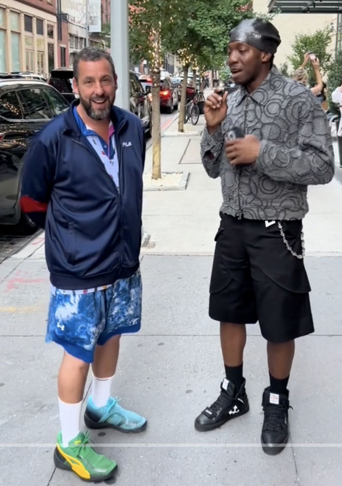 Adam Sandler dishes out fashion tips on TikTok while in his legendary, goofy dad attire.