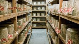 We have some difficult news to share. Neal's Yard Dairy has been the victim of a theft resulting in the loss of over 22 tonnes of clothbound Cheddar.<br /><br /><br />The theft involved a fraudulent buyer posing as a legitimate wholesale distributor for a major French retailer. Over 950 wheels of Hafod, Westcombe, and Pitchfork Cheddar were delivered before the fraud was discovered. Despite the significant financial blow, we have honoured our commitment to our small-scale suppliers and paid all three artisan cheesemakers in full.<br /><br /><br />We are currently working with law enforcement authorities to identify the perpetrators of this fraud. In the meantime, we would like to put out a call to everyone within our esteemed community of cheesemongers around the world. If anyone is offered or receives cheeses they believe may have been associated with this theft, particularly clothbound Cheddars in a 10kg or 24kg format with the tags detached, please contact info@nealsyarddairy.co.uk so we can support the police in their investigation.