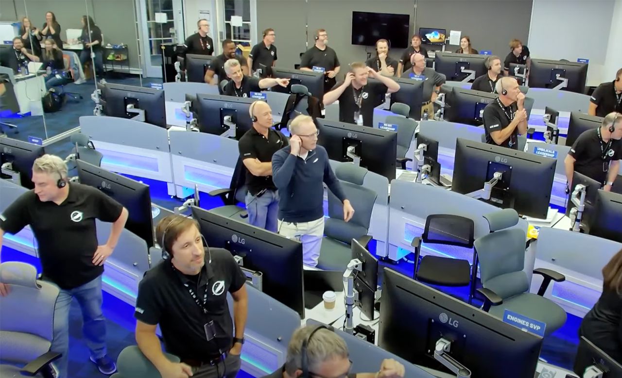 Jeff Bezos is seen in the control room along with company engineers and launch officials.