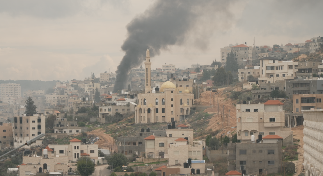 smoke billows from jenin refugee camp in the occupied west bank on friday.