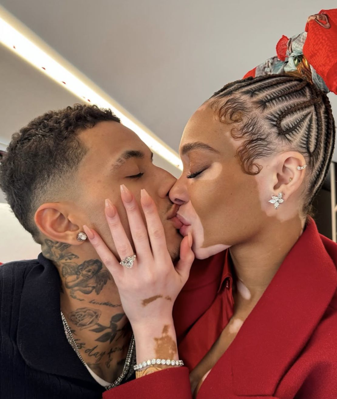 Winnie Harlow (right) and Kyle Kuzma (left) pictured in an image showing her engagement ring.