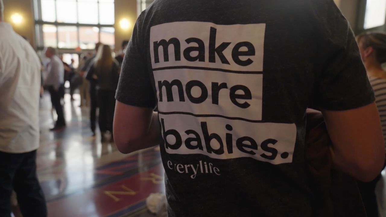 An attendee wears a shirt promoting higher birth rates is seen at the Natal Conference.