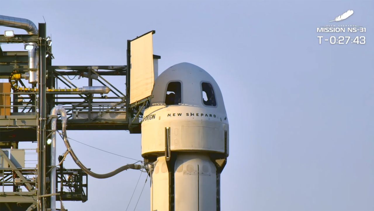 In this screenshot from video, the Blue Origin New Shepard capsule is seen after the crew entered in West Texas, on Monday.