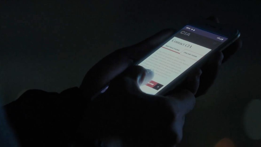 In the final scene of the video, a Chinese government worker contacts the CIA.