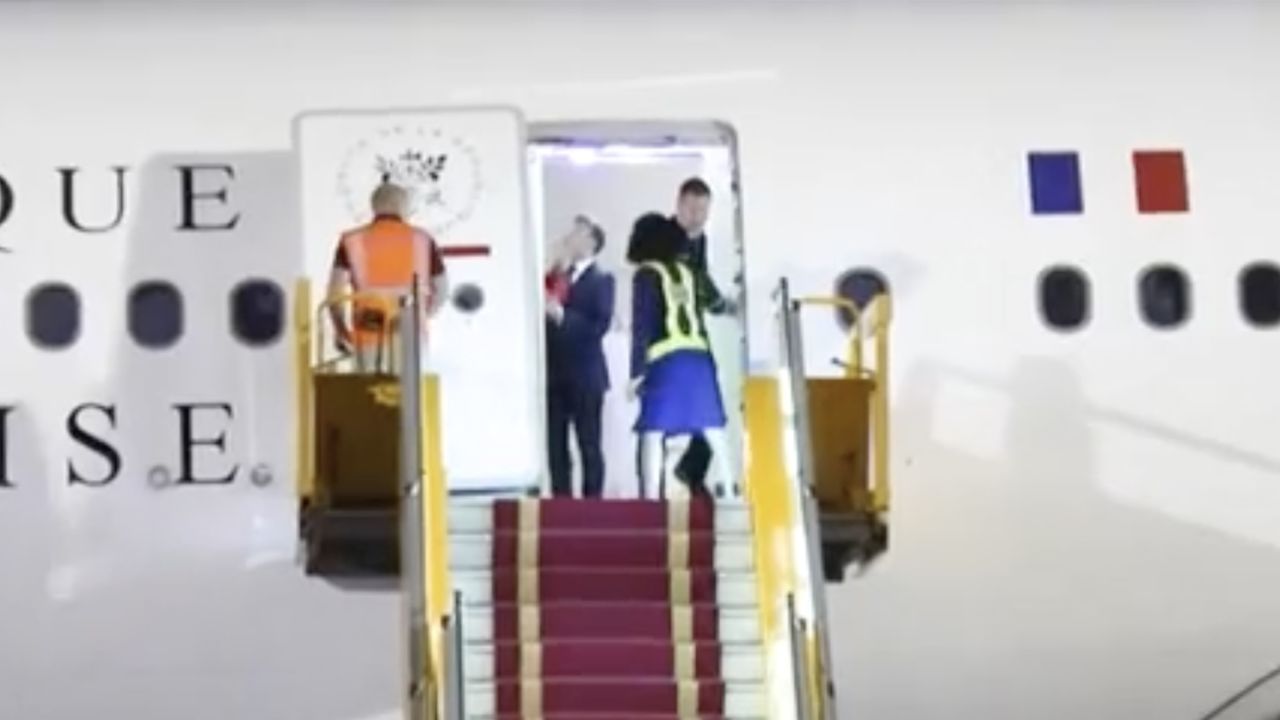 France's President Emmanuel Macron and his wife Brigitte Macron arrive at Noi Bai International Airport, marking the first trip to Vietnam by a French president in nearly a decade, in Hanoi, Vietnam, May 25, 2025