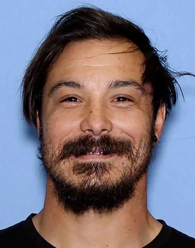 Travis Decker is seen in an undated photo released by authorities as they continue to ask for tips on his whereabouts.