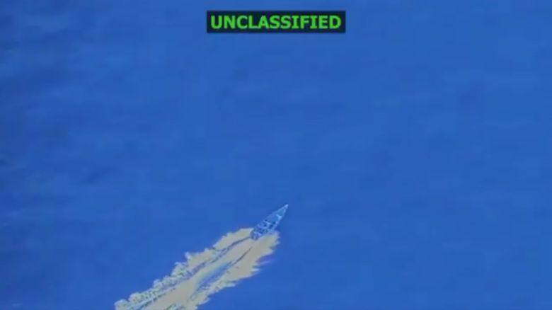 In this screengrab taken from a video posted by Defense Secretary Pete Hegseth on October 3, 2025, a boat is visible just before it is hit by a military strike, off the coast of Venezuela. In his post, Hegseth said the boat was trafficking narcotics and that four men onboard were killed.