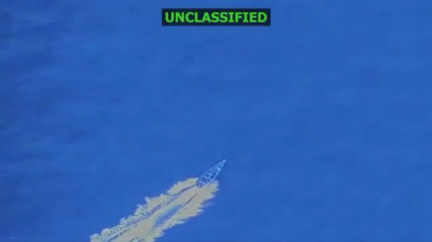 In this screengrab taken from a video posted by Defense Secretary Pete Hegseth on October 3, a boat is visible just before it is hit by a military strike, off the coast of Venezuela.