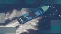 In this screengrab of a video shared by Defense Secretary Pete Hegseth on October 22, 2025, a boat is seen shortly before it is hit by a strike, on October 21, 2025. Hegseth said two people onboard were killed.