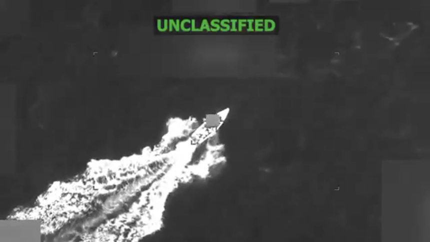 This screengrab from a video shows a boat in the Carribbean, shortly before it was hit by a US military strike.