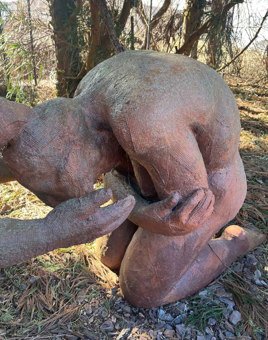 Suse Lowenstein created a sculptural portrait of herself as a part of her piece, Dark Elegy. It depicts her crumpled in grief at the moment she learned her son's plane had been bombed.