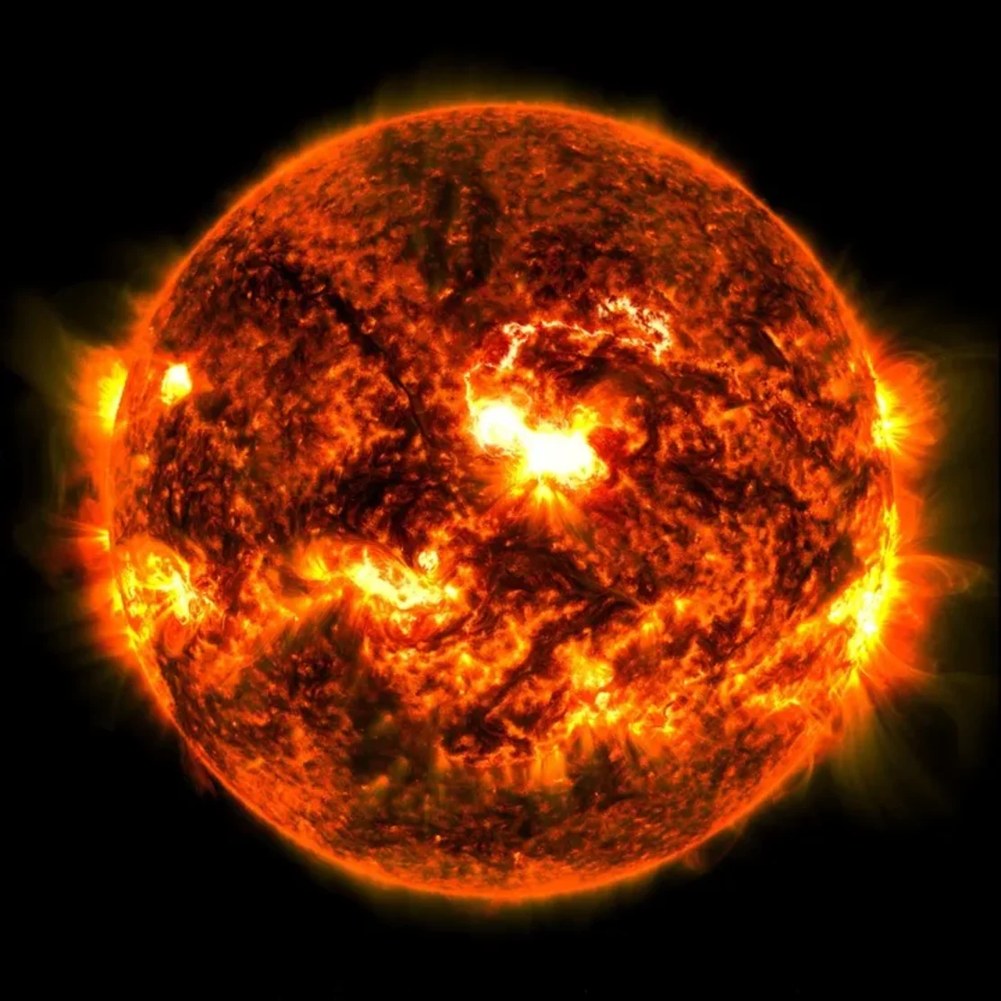 NASA’s Solar Dynamics Observatory captured this image of a solar flare — seen as the bright flash in the center of the sun’s disk — on October 8.