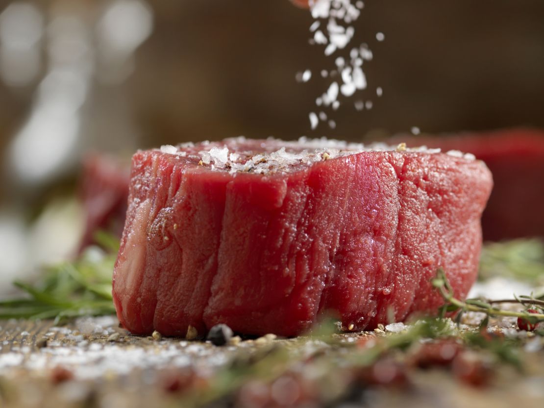 seasoning-steak-with-salt.jpeg
