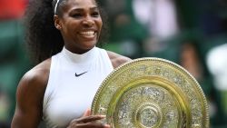 US player Serena Williams poses with the winner's trophy, the Venus Rosewater Dish, after her women's singles final victory over Germany's Angelique Kerber on the thirteenth day of the 2016 Wimbledon Championships at The All England Lawn Tennis Club in Wimbledon, southwest London, on July 9, 2016. (Photo by GLYN KIRK / AFP) / RESTRICTED TO EDITORIAL USE (Photo by GLYN KIRK/AFP via Getty Images)