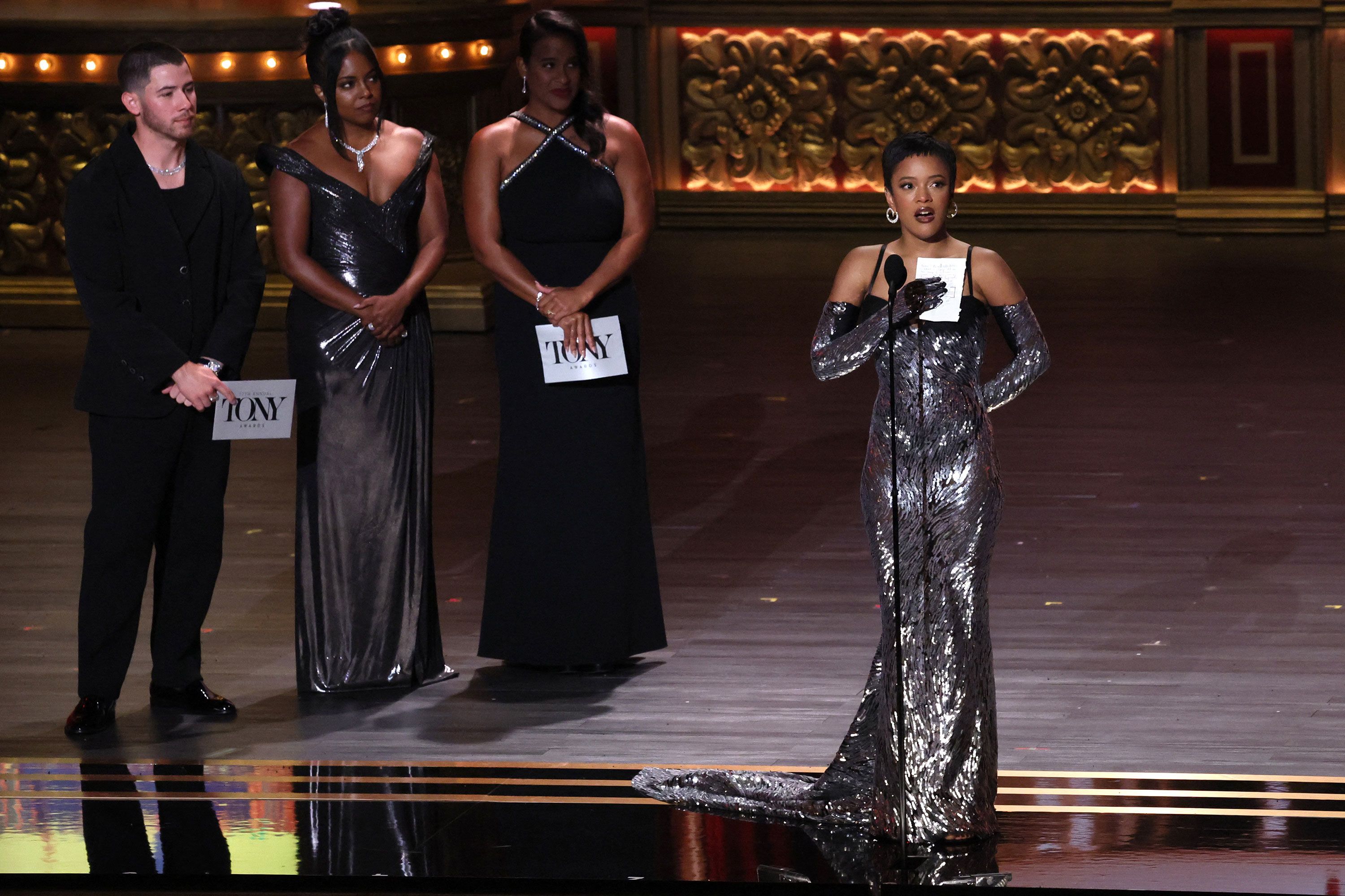 Maleah Joi Moon accepts the award for best performance by an actress in a leading role in a musical for her role in "Hell's Kitchen."