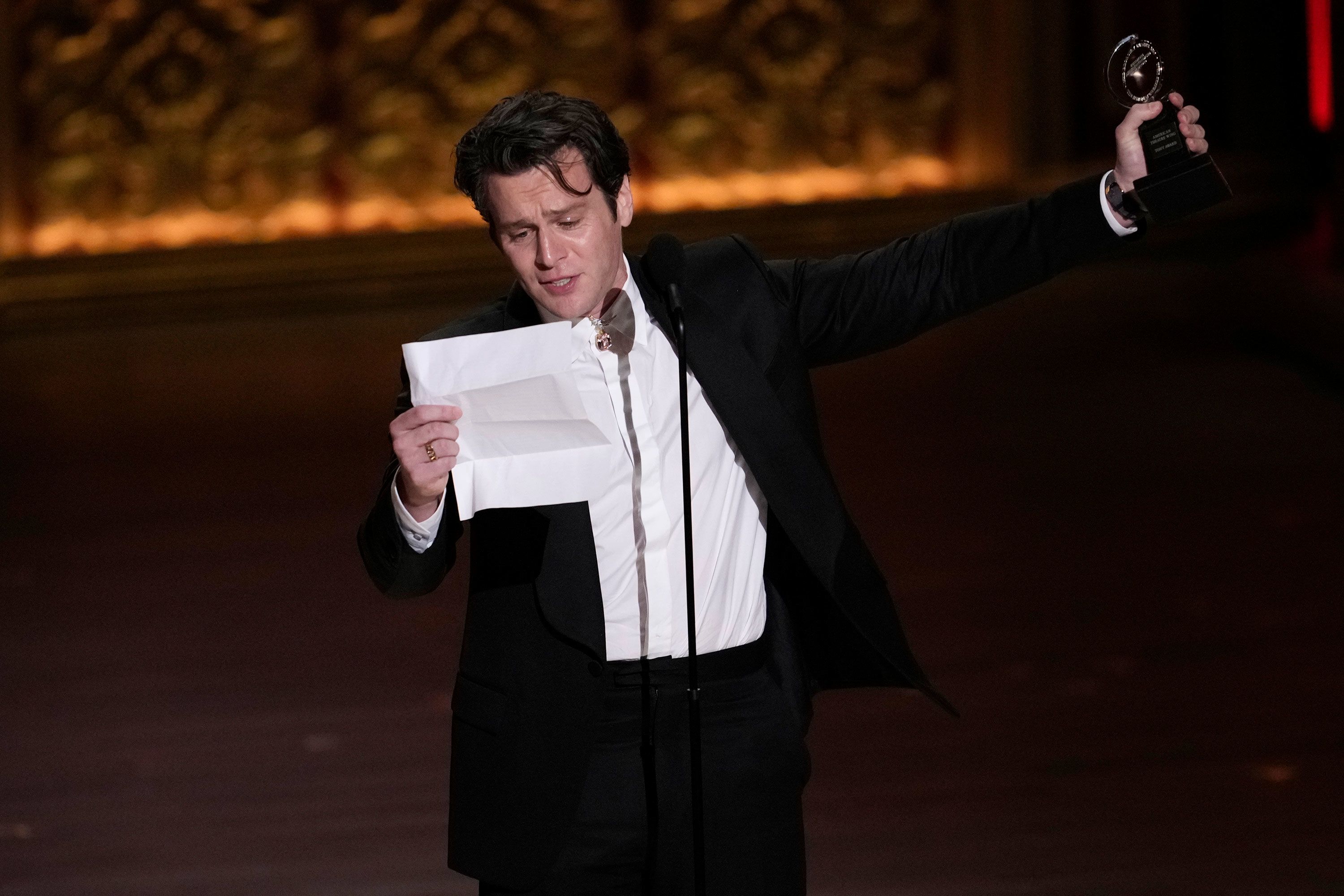 Jonathan Groff accepts the award for best performance by an actor in a leading role in a musical for his role in "Merrily We Roll Along."