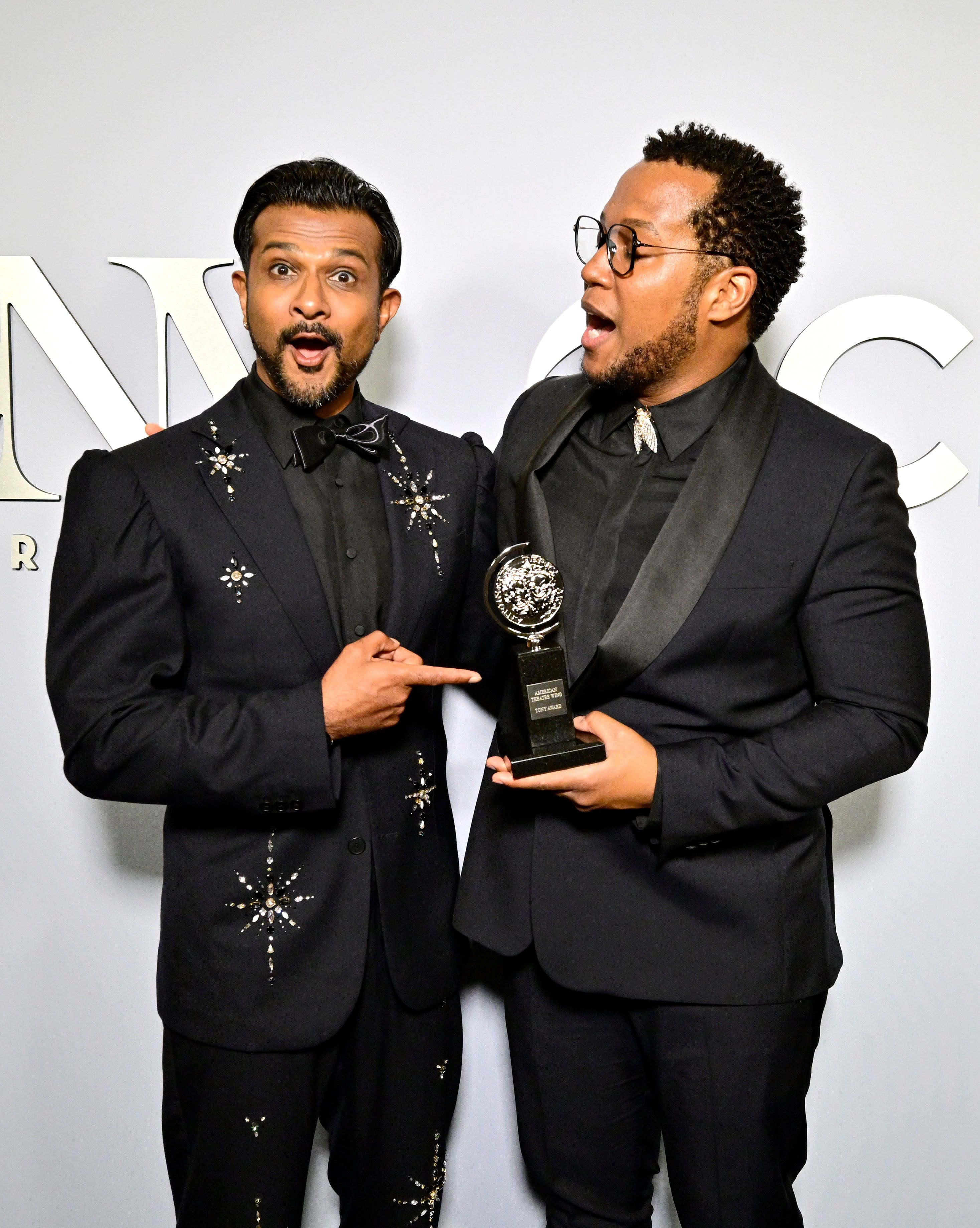 Utkarsh Ambudkar and playwright Branden Jacobs-Jenkins, winner of the best revival of a play award for "Appropriate," pose for a photo backstage.