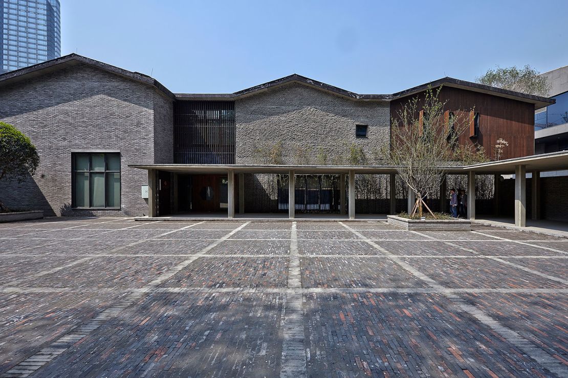 At the Shuijingfang Museum, Liu sensitively surrounded the site's prexisting wood-framed buildings with new concrete structures.