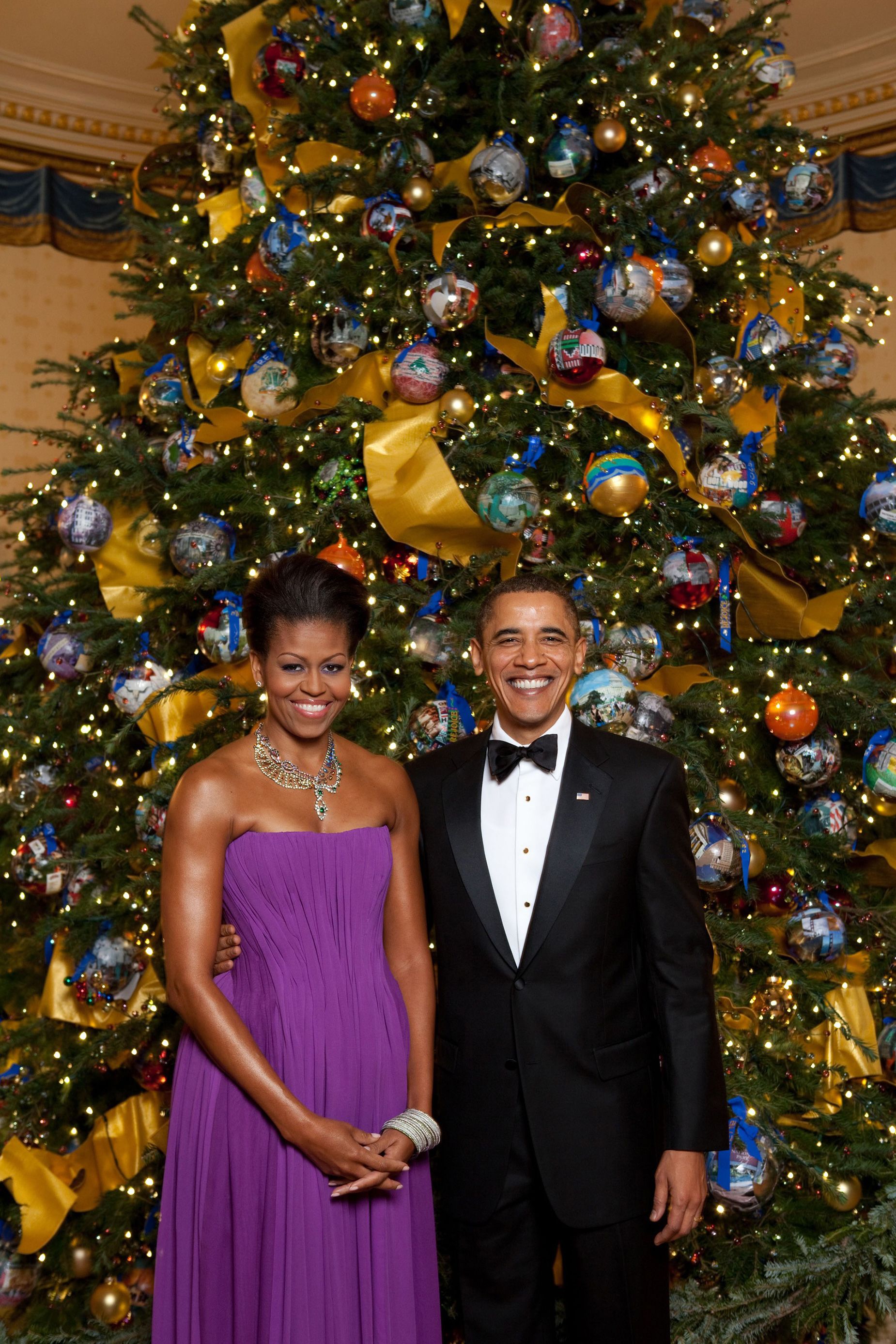 <strong>2009: </strong>President Obama and first lady Michelle Obama in front of the White House Christmas Tree, decorated for the theme "Reflect, Rejoice, Renew."