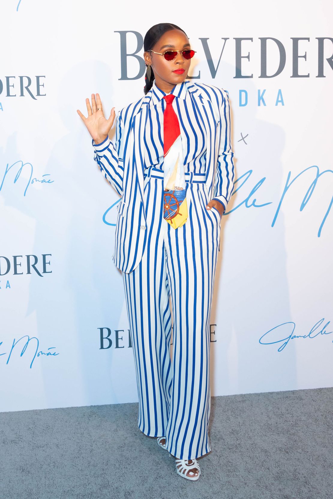 Janelle Monáe’s distinct style and flourishes, which include whimsically tailored suits (such as the one pictured by Ralph Lauren) personify the dandy style.