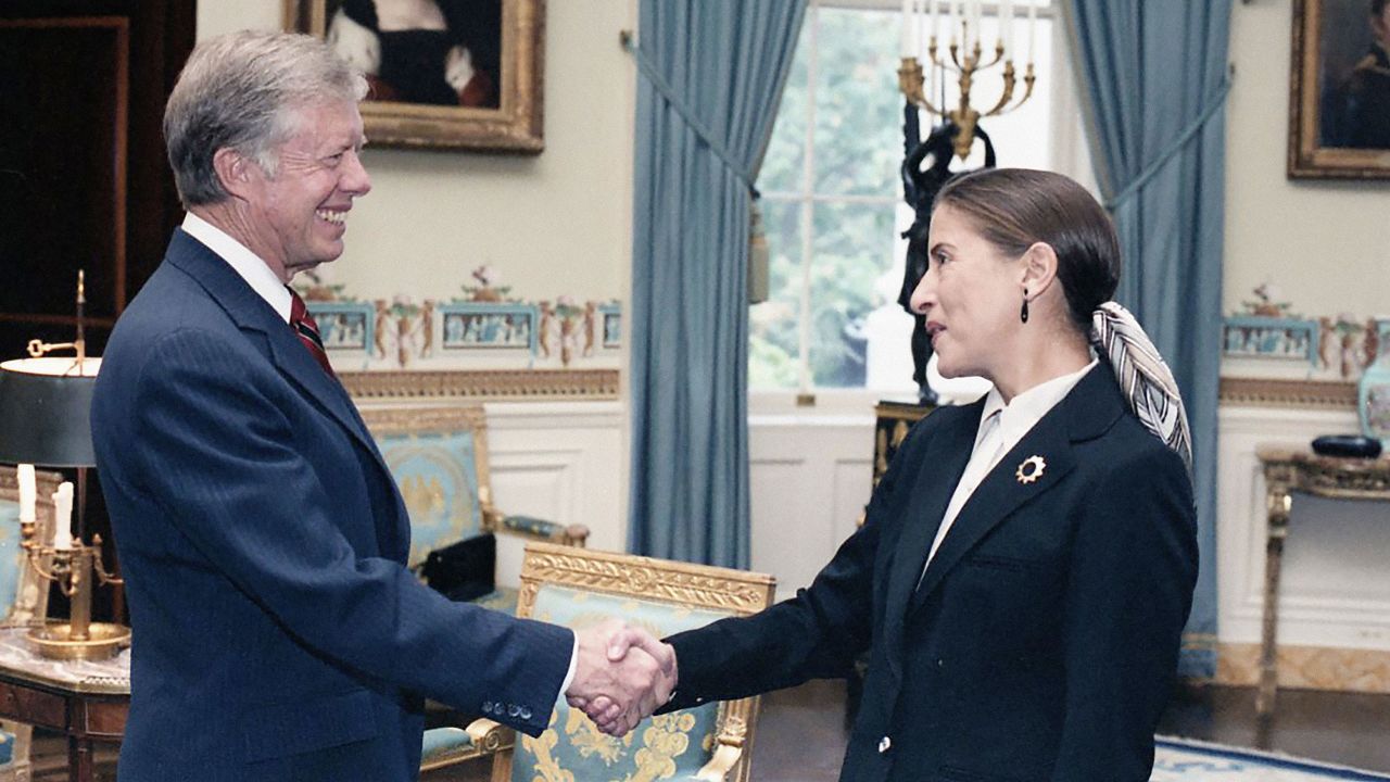 President Jimmy Carter shakes hands with Ruth Bader Ginsburg at a White House reception for women federal judges in October 1980.