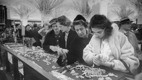 Please contact your Account Representative for licensing use on merchandise and/or resale products; fine art prints, wall dÃ©cor, gallery, nonprofit or museum displays.
Mandatory Credit: Photo by Alfred Eisenstaedt/The LIFE Picture Collection/Shutterstock (12125701b)
Shoppers looking at jewels in the jewelry department store of Saks Fifth Avenue in New York, United States in November 1960
Saks Fifth Avenue Department Store, New York, USA