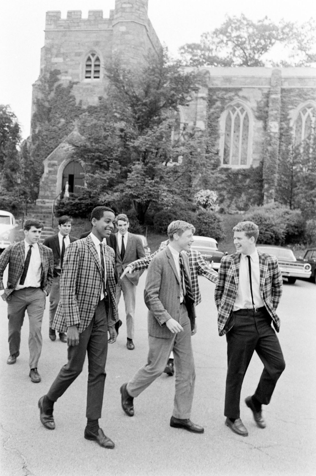 Students in madras blazers walk around the Milton Academy campus in Milton, Massachusetts in 1966.
