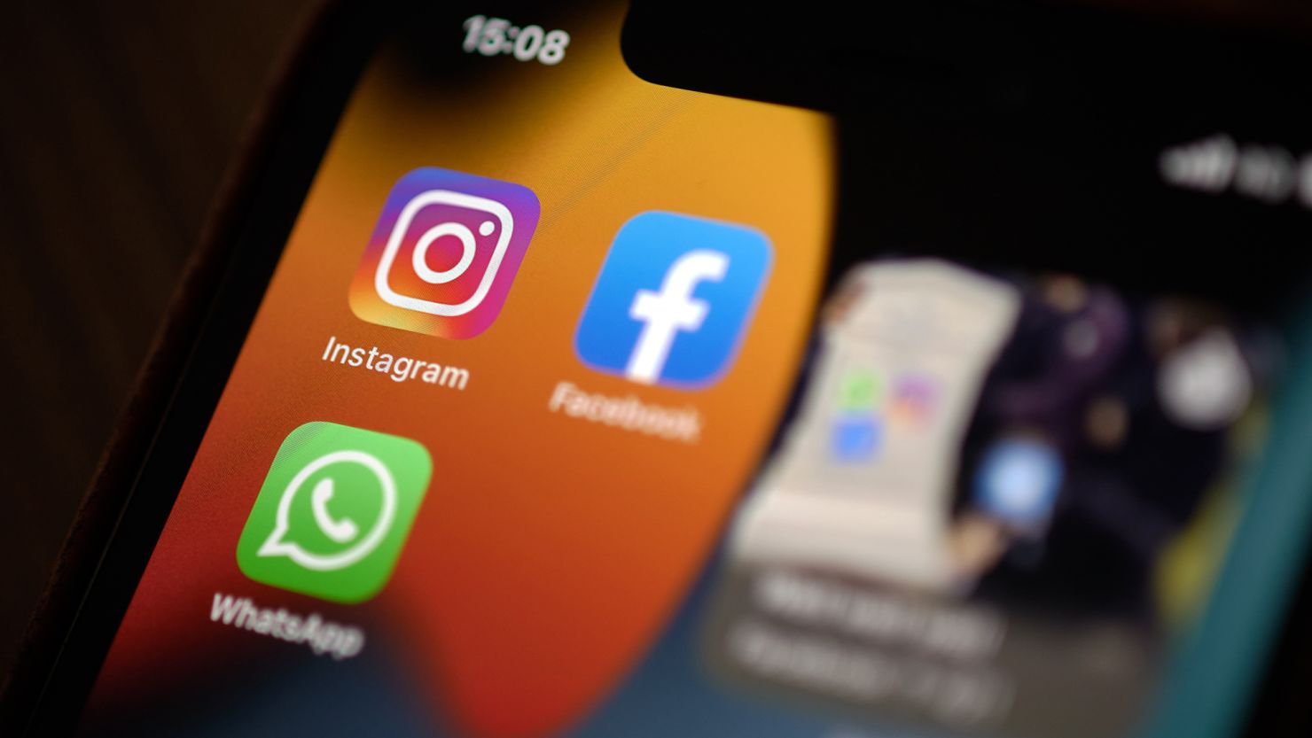 Instagram, Facebook and Whatsapp applications seen on a mobile phone.