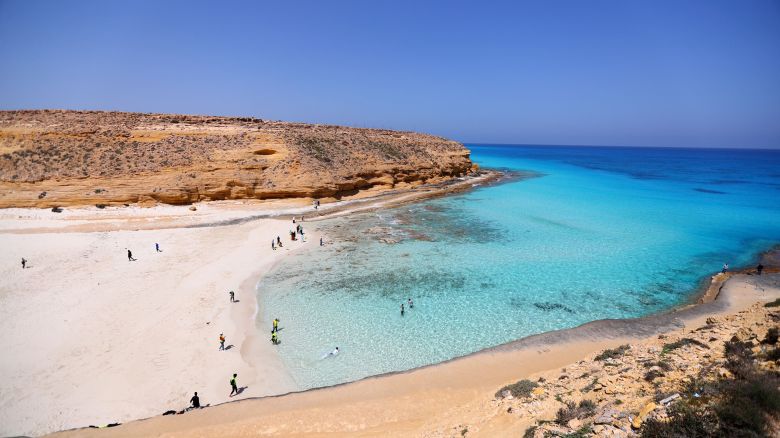 Tourists visit the Ageeba Beach at the north coast city of Marsa Matrouh, Egypt, March 27, 2022. Marsa Matrouh, a resort city on the coast of the Mediterranean Sea, is famous for its soft white sandy beaches and transparent sapphire-color sea water.