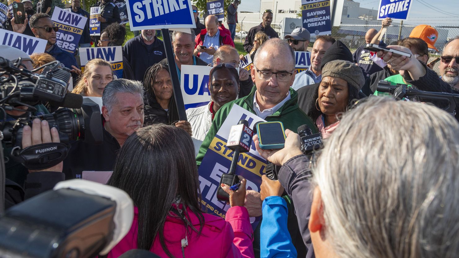 United Auto Workers President Shawn Fain at the picket line at the Stellantis plant in Sterling Heights Michigan on Monday. The union is reportedly getting close to to deals to end strikes at both GM and Stellantis.