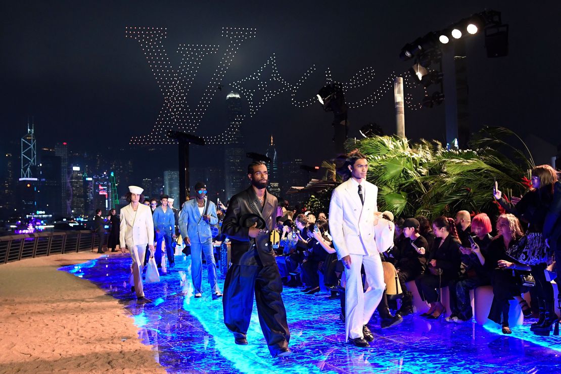 Drones took to the air to spell out the brand’s LVERS logo as models walked the catwalk.