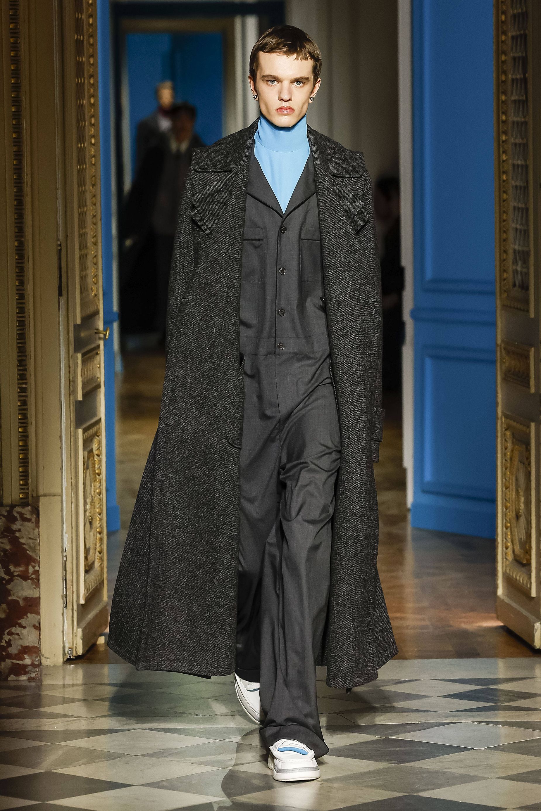 At Valentino, Pierpaolo Piccioli punctuated a palette of predominantly black, grey and cream with sky blue — seen on bags, quilted tops and wool duffle coats.
