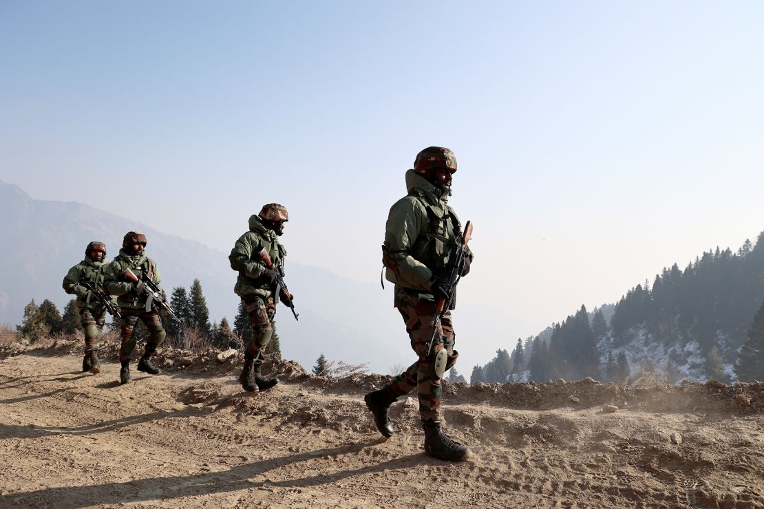 Indian soldiers patrol the de facto border between Pakistan and India in Jammu and Kashmir earlier this year.