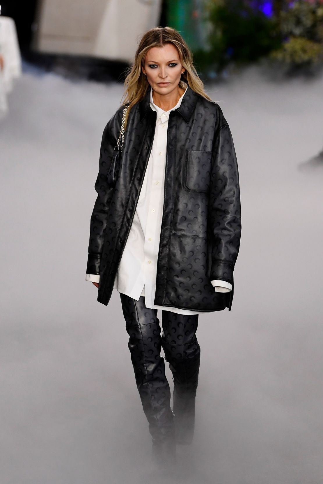 Kate Moss lookalike Denise Ohnona walked the runway for up-and-coming designer Marine Serre at Paris Fashion Week in March 2024.
