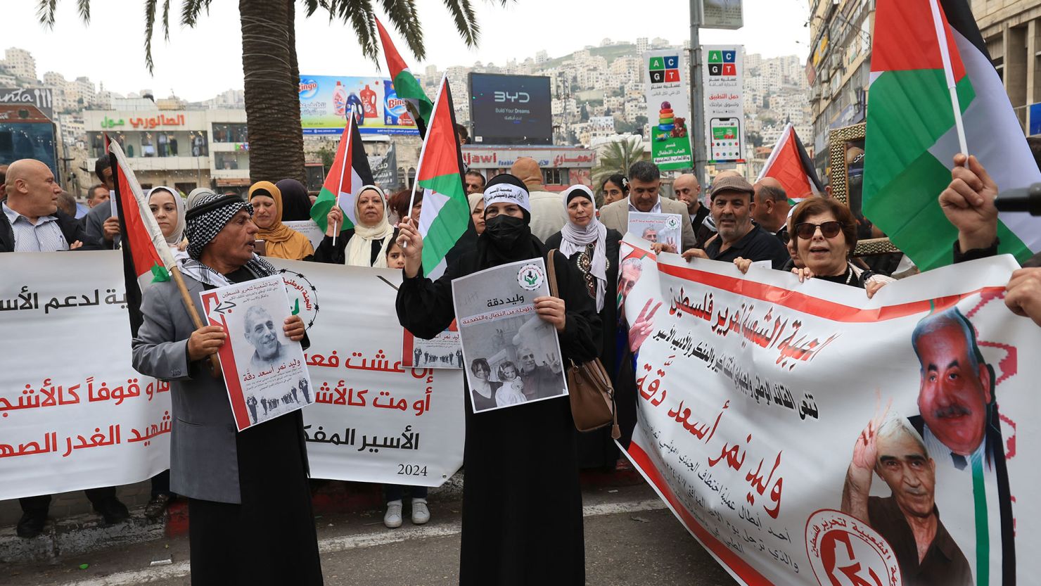 People protest following the death in an Israeli jail of terminally ill Palestinian activist and novelist Walid Daqqa, in the West Bank City of Nablus, on Monday.