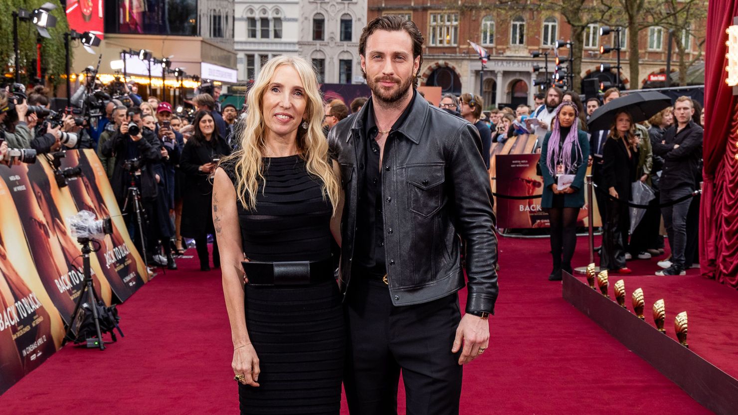Sam Taylor-Johnson (left) and husband Aaron (right) pictured in London on April 8.