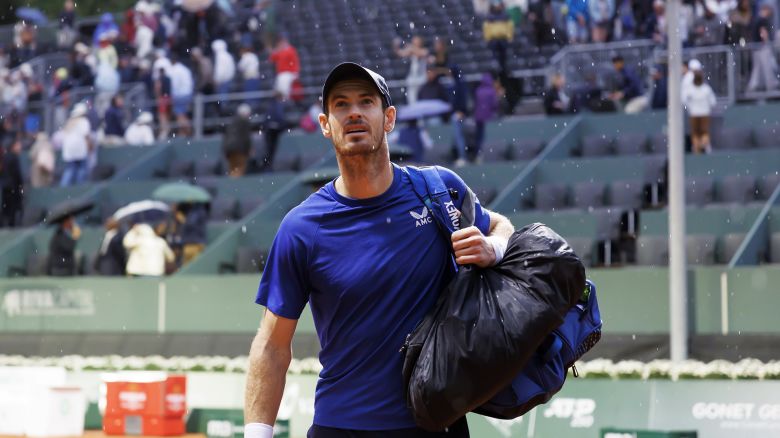 Mandatory Credit: Photo by SALVATORE DI NOLFI/EPA-EFE/Shutterstock (14492459as)
Andy Murray, of Great Britain, leaves the court under the rainfall during the men's singles first round against Yannick Hanfmann, of Germany, at the ATP 250 Geneva Open tournament in Geneva, Switzerland, 20 May 2024.
Geneva Open tennis tournament, Switzerland - 20 May 2024