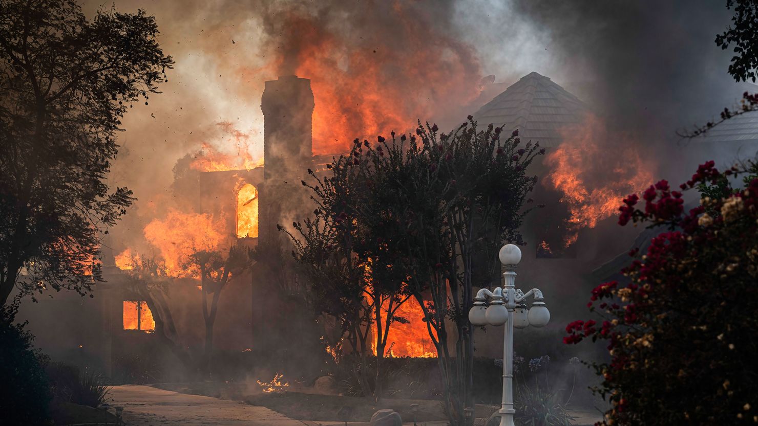 Evacuation orders were issued after the fire began destroying homes.