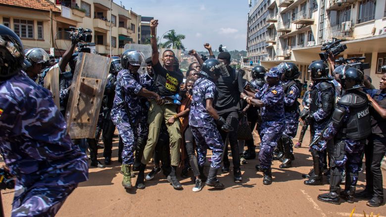 Demonstrators are detained by police after trying to reach the Ugandan Parliament during an anti-corruption march in Kampala, Uganda, on 23 July 2024.