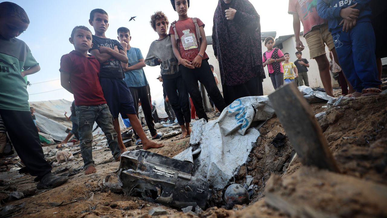 The aftermath of a reported overnight Israeli strike that hits tents used as temporary shelters by displaced Palestinians in the courtyard of the Al-Aqsa Martyrs hospital in Deir el-Balah, Gaza, on September 27.