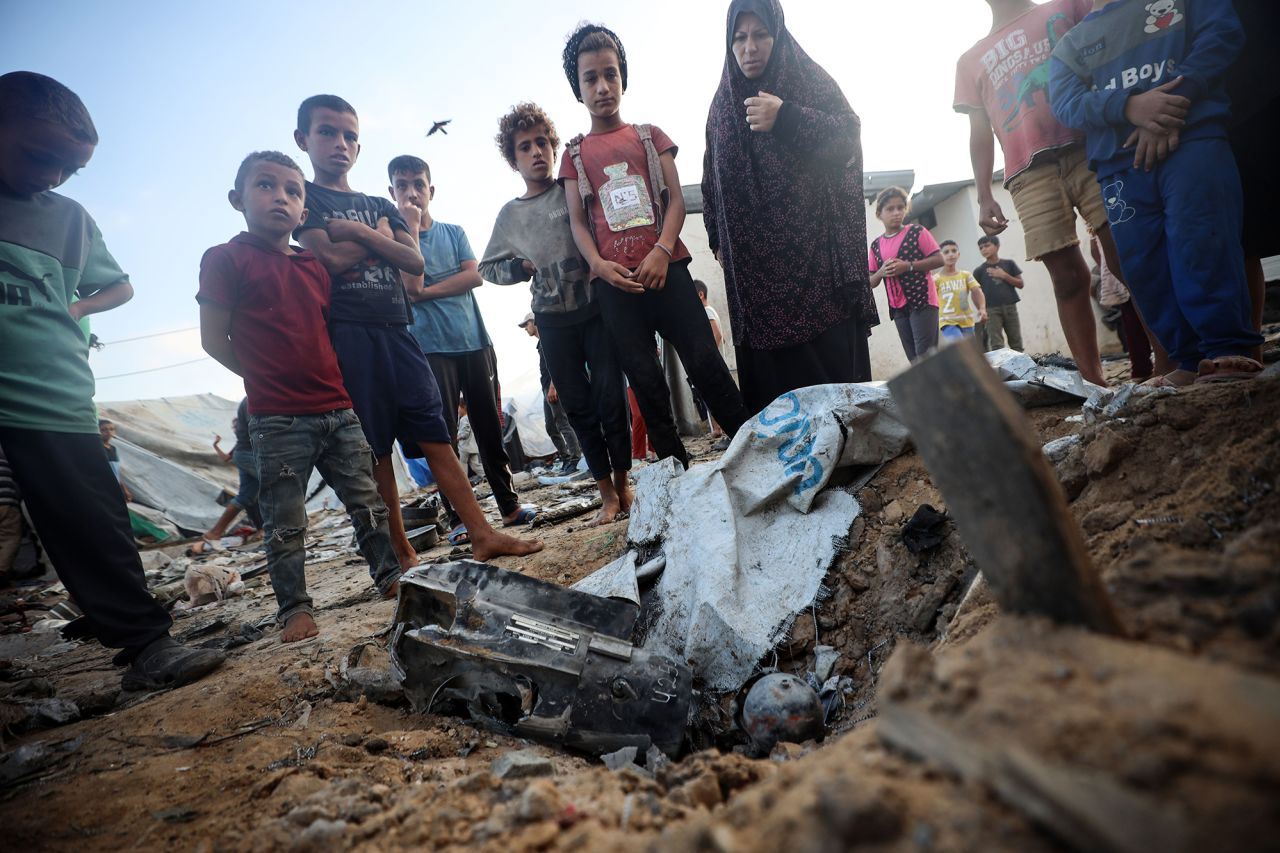 The aftermath of a reported overnight Israeli strike that hits tents used as temporary shelters by displaced Palestinians in the courtyard of the Al-Aqsa Martyrs hospital in Deir el-Balah, Gaza, on September 27.